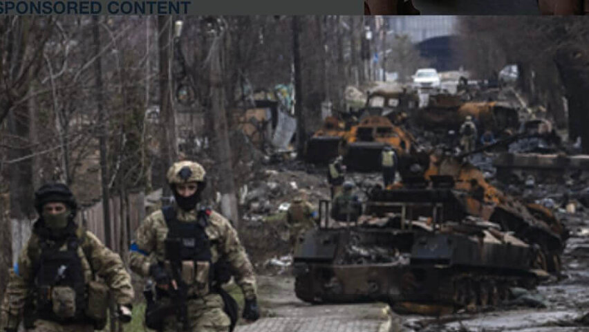 ukraine soldiers and ruined tanks